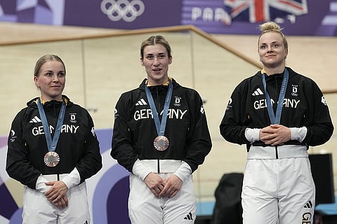 Paris Olympics Track Cycling women's team sprint: Bronze medallists Germany's Lea Friedrich, left, Pauline Grabosch, center, and Emma Hinze